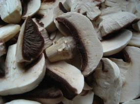Chopped button mushrooms waiting for a marinade